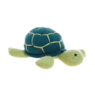 This is a green accent pieces by Global Goods Partners called knit sea turtle toy in standard