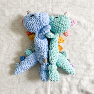 This is a multicolorassorted-colors accent pieces by Two Little Knots called custom dinosaur lovey in standard