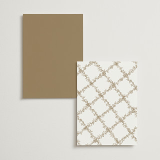 This is a ivory table numbers with foil pressed by Cass Loh called boho flower crest printing on doublethick in standard