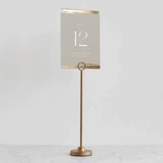 This is a brass place card holders by Minted called brass round in standard