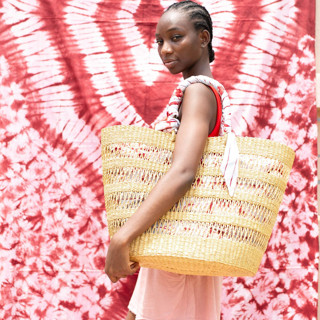 This is a natural back to school supplies by AKETEKETE called ayine bag large with light blue and red lining in standard