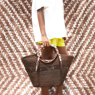 This is a brown back to school supplies by AKETEKETE called butterfly bag brown medium with brown and peacock lining in standard