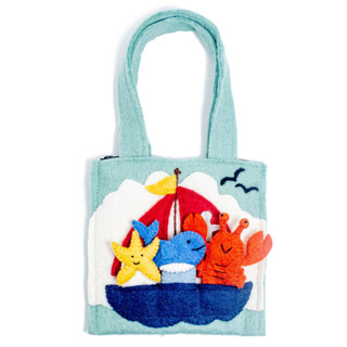 This is a multicolor home decor by Global Goods Partners called nautical puppet bag in standard