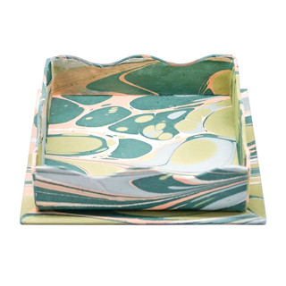 This is a green decorative objects by Michelle Pham called nesting scalloped hand-marbled trays in green and pink - large in standard