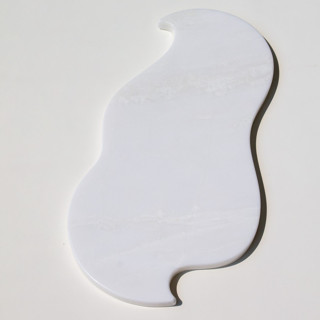 This is a white decorative objects by the parmatile shop called medusa marble tray (milk) in standard