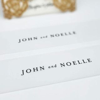 This is a white belly bands by Caroline Russo called personalized vellum bellybands for 5 x 7 invitations (set of 25) in standard