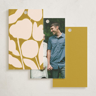 This is a mustard baby shower favor tags with standard by Sierra Lee called flora printing on signature in tag