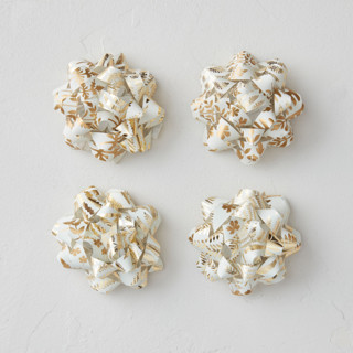 This is a gilded wrapping paper by Mercedes called gold ferns in standard