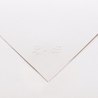 This is a black wedding stationery by Cedar and Grey called custom monogram embosser no. 7 in standard