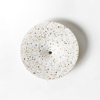 This is a white accent pieces by Pretti.Cool called white terrazzo dimple wall hook, medium in standard