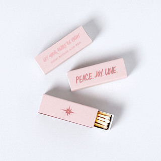 This is a pink matchbooks by ForYourParty called custom peace. joy. love. matchboxes, set of 100 in standard