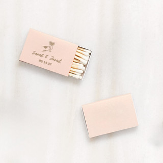 This is a beige matchbooks by ForYourParty called toasting hands wedding matchbox, set of 100 in standard