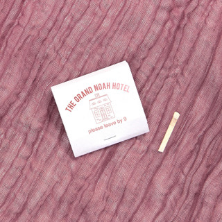 This is a white matchbooks by ForYourParty called hotel check out matchbooks, set of 50 in standard