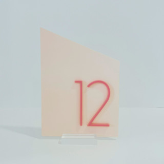 This is a pink table numbers by Alexandra Ettis called geometric acrylic table number in standard