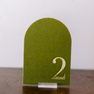 This is a green table numbers by Velvet Raptor called table number - arch - avocado in standard