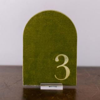 This is a green table numbers by Velvet Raptor called double sided table number - arch - avocado in standard