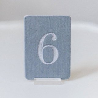 This is a gray table numbers by Velvet Raptor called small rectangle table number - dove in standard