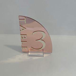 This is a copper table numbers by Alexandra Ettis called half arch table number in standard