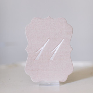 This is a pink table numbers by Velvet Raptor called blush script scroll table number in standard