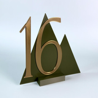 This is a green table numbers by Corduroy Effect called mountain table number in standard