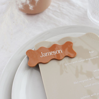 This is a gold wedding place cards by Aislinn Minardi called customizable wavy place card in standard