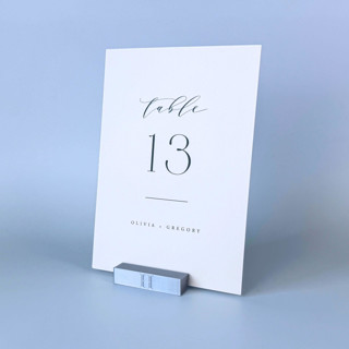 This is a silver place card holders by Corduroy Effect called personalized silver color rectangle table number holders, set of 5 in standard