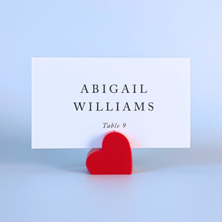 This is a red place card holders by Corduroy Effect called red heart place card holders, set of 10 in standard