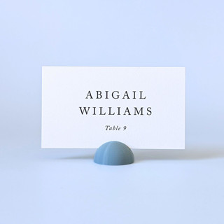 This is a blue place card holders by Corduroy Effect called dusty blue dome place card holders, set of 25 in standard