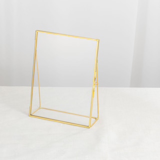 This is a gold place card holders by Lea Li called brass and glass gold vertical 6x8" card holder in standard
