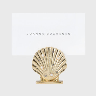 This is a gold place card holders by Joanna Buchanan called shell placecard holders, set of four in standard