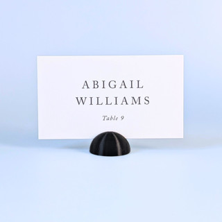 This is a black place card holders by Corduroy Effect called black dome place card holders, set of 25 in standard