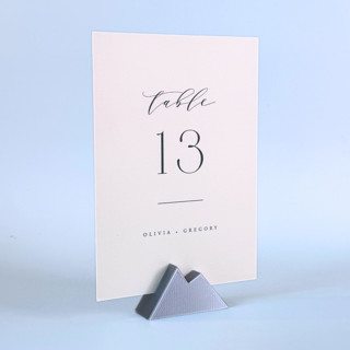 This is a silver place card holders by Corduroy Effect called silver color mountain table number holder, set of 5 in standard