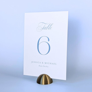 This is a brass place card holders by Corduroy Effect called brass color dome table number holders, set of 5 in standard