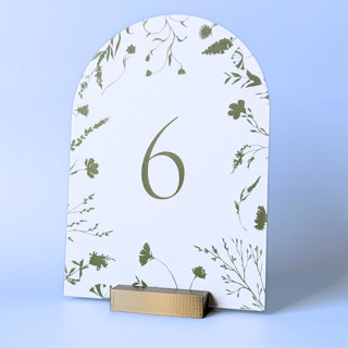 This is a gold place card holders by Corduroy Effect called brass color rectangle table number holder, set of 5 in standard