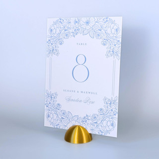 This is a gold place card holders by Corduroy Effect called gold color dome table number holders, set of 5 in standard