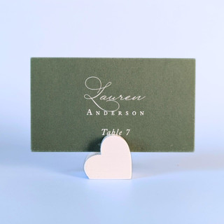 This is a white place card holders by Corduroy Effect called white heart place card holders, set of 10 in standard