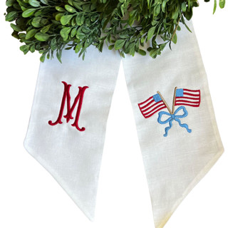 This is a white holiday decorations by Virginia Marcello called personalized patriotic wreath sash in standard