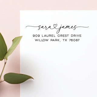 This is a black address labels by Sara Luke called custom heart return address stamp for wedding invitations | personalized self-inking stamp in standard