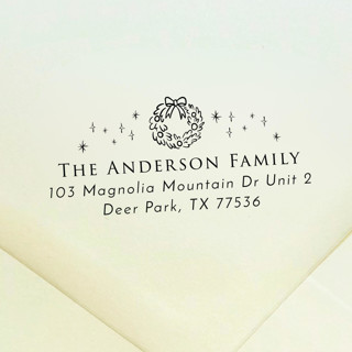 This is a black address labels by Samantha Malvey called wreath address stamp | self inking return address stamp in standard
