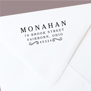 This is a black address labels by The Homebody Society called custom return address stamp | scroll design | bold and beautiful | self-inking in standard