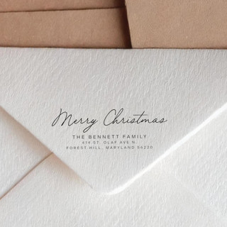 This is a black address labels by Sara Luke called elegant address stamp for christmas cards | self-inking stamp in standard