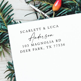 This is a black address labels by Samantha Malvey called calligraphy couple names address stamp | self inking return address stamp in standard