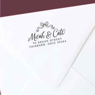 This is a black address labels by The Homebody Society called custom return address stamp | victorian bow design | self-inking in standard