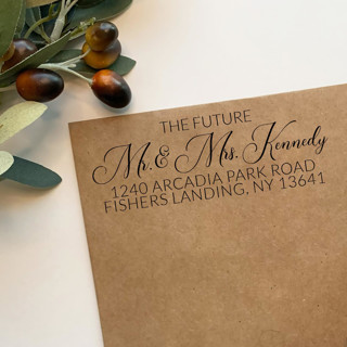 This is a white address labels by Casey Harp called custom script wedding address stamp | self-inking | black ink in standard