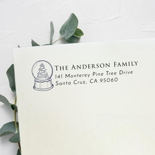 This is a black address labels by Samantha Malvey called snowglobe address stamp, left aligned | self inking return address stamp in standard