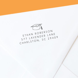 This is a black address labels by The Homebody Society called personalized self-inking return address stamp | modern graduation announcements | graduation hat in standard