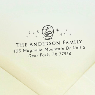 This is a black address labels by Samantha Malvey called snowglobe address stamp | self inking return address stamp in standard