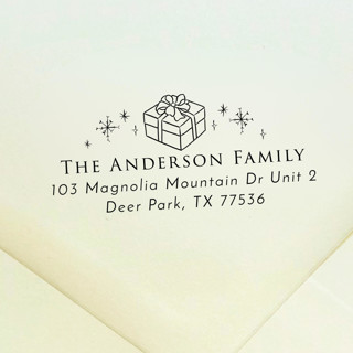 This is a black address labels by Samantha Malvey called gift address stamp | self inking return address stamp in standard