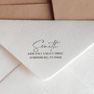 This is a black address labels by Sara Luke called personalized script return address stamp | self-inking stamp in standard