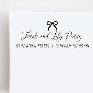 This is a black address labels by Sara Luke called romantic bow custom address self-inking stamp in standard